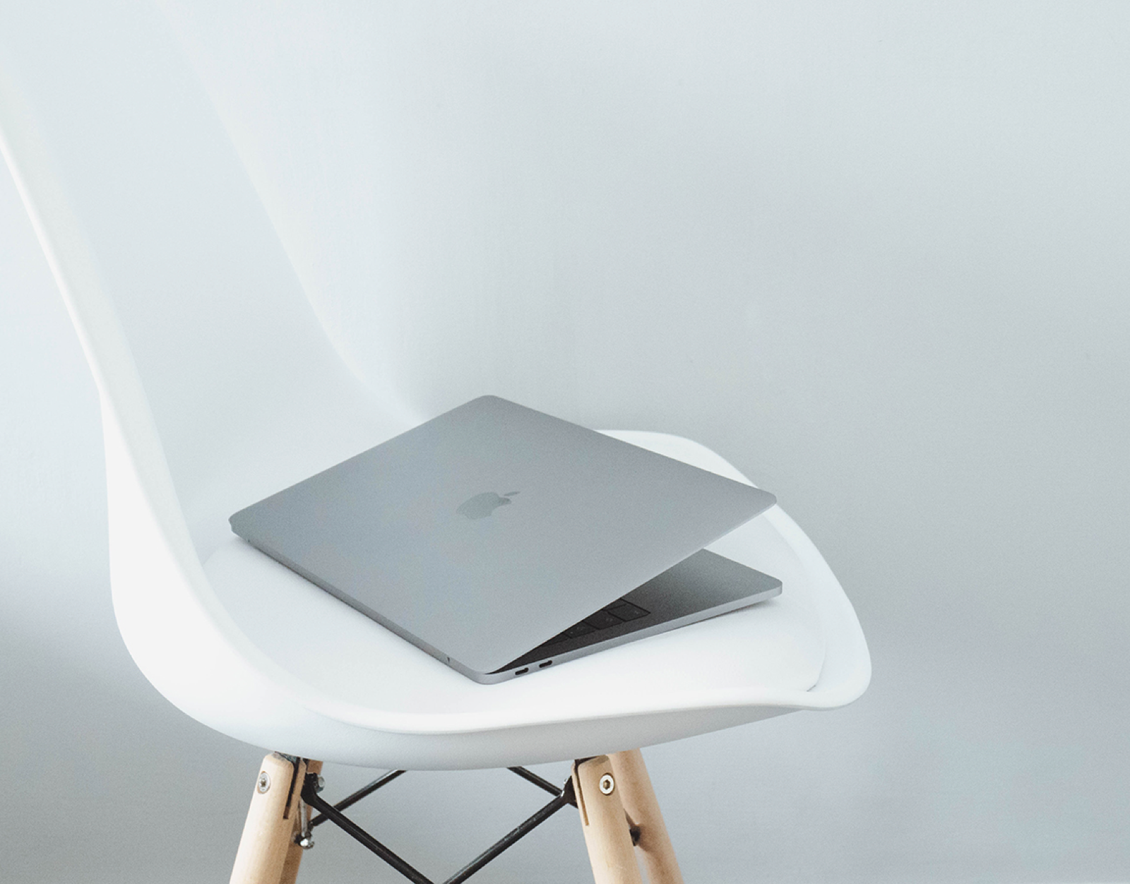 Laptop in a white chair
